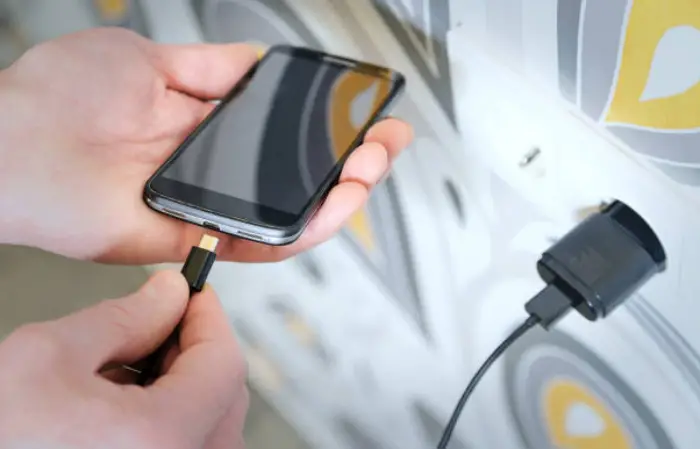 reconnect the phone's charging port with the charging cable